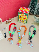 Load image into Gallery viewer, Christmas Surprise Box - Phone Wrist Strap with Surprise Charm